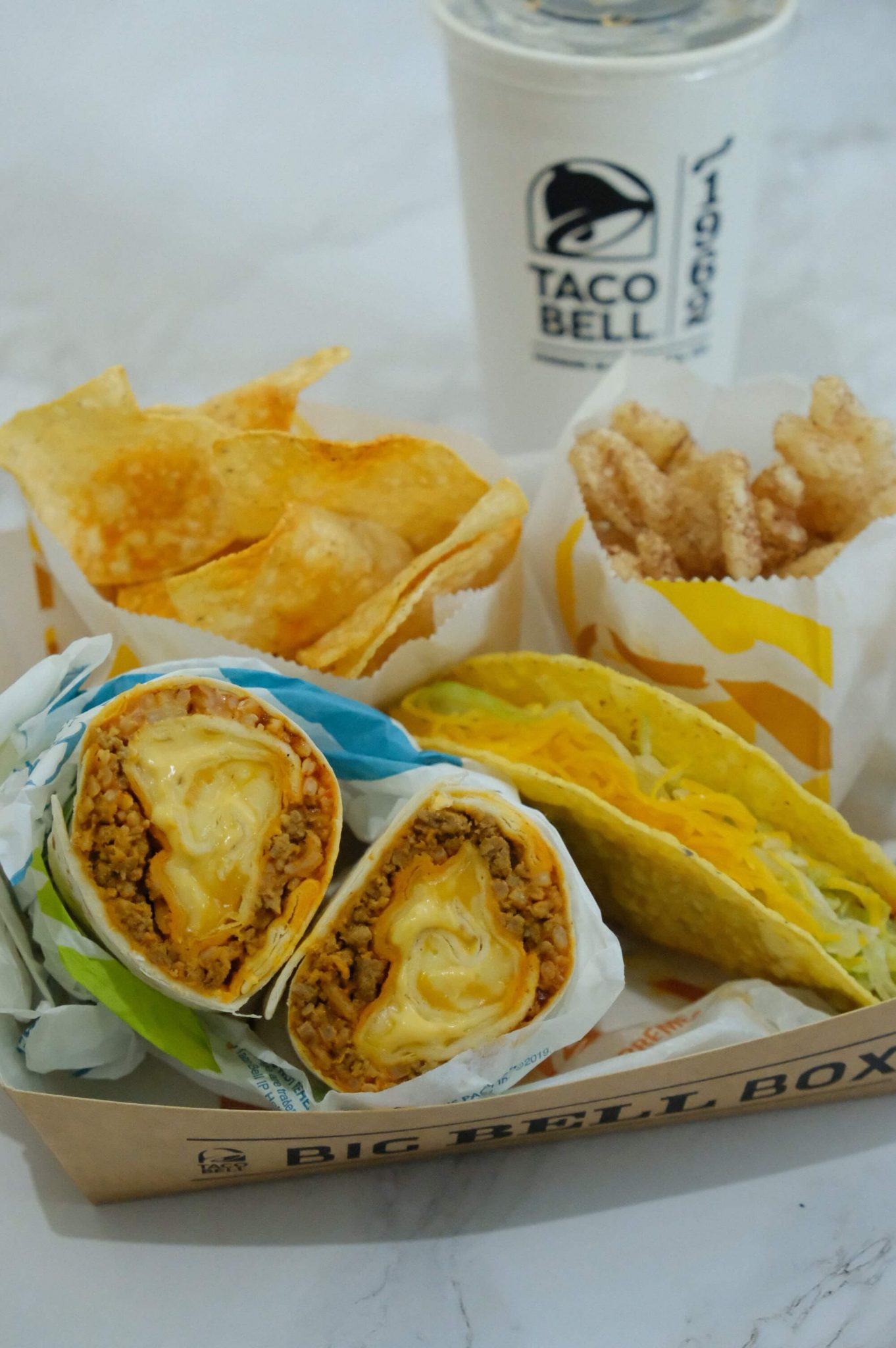 Cheesy Core Sriracha Burrito Now Available at Taco Bell ClickTheCity