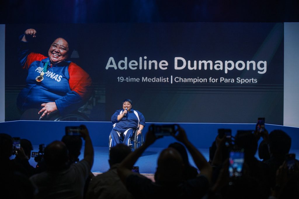 Adeline Dumapong Talking onstage 2 Large