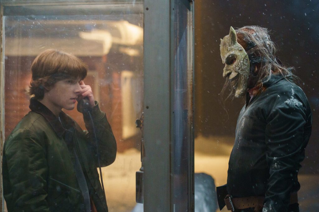 True Evil Never Dies: The Grabber Returns in "Black Phone 2," Starring Ethan Hawke and Mason Thames 2 BP2 phonebooth min