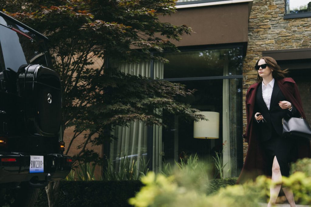 Yorgos Lanthimos Reunites with Emma Stone & Jesse Plemons in "Bugonia" — A Dark, Thrilling Tale of Paranoia and Abduction 2 Bugonia Emma Suit