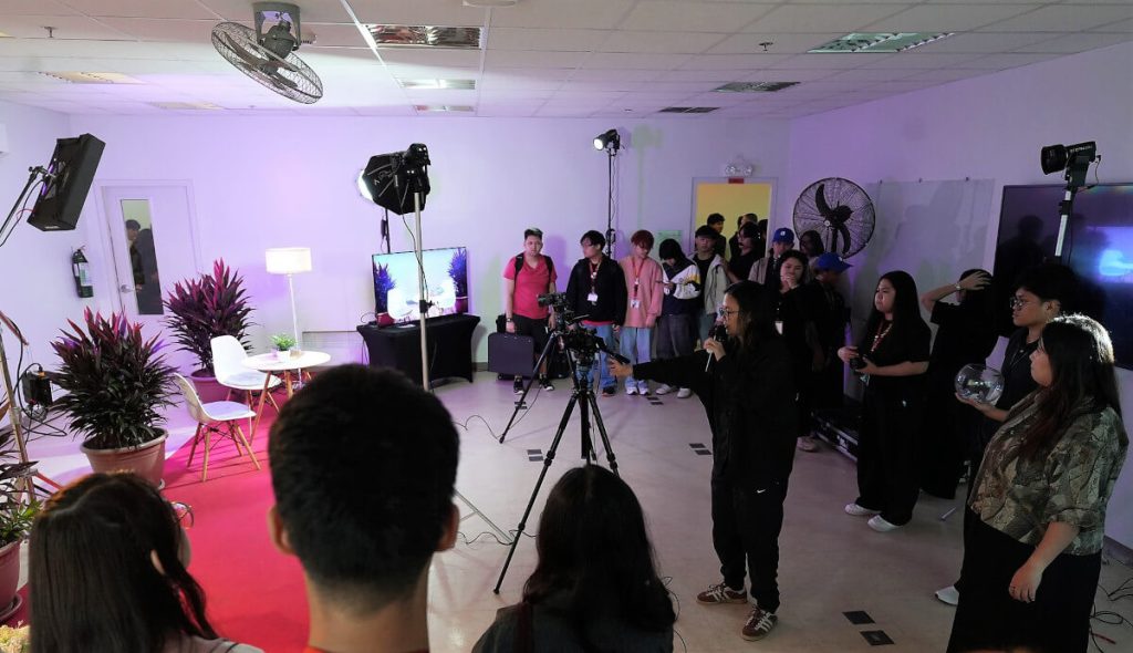 Tey Clamor guides students during the workshop