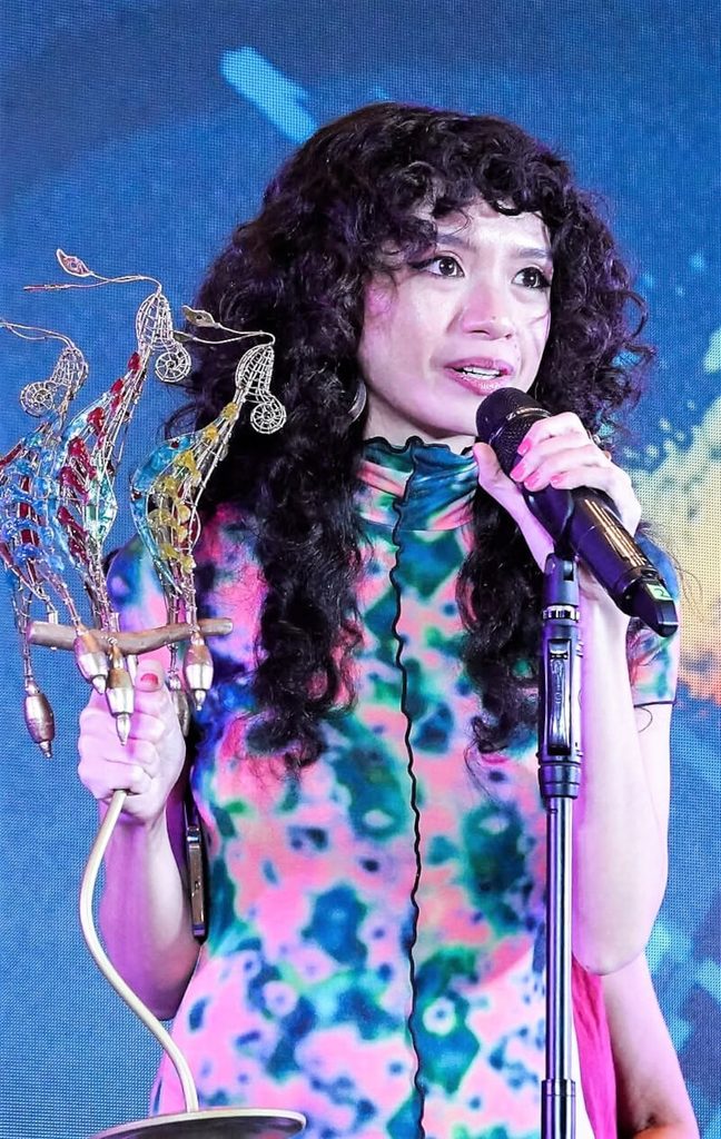 Benilde MMA Alumna Repeats as Best Director at Cinemalaya 1 Gabriela Serrano with her second Best Director trophy at Cinemalaya 22