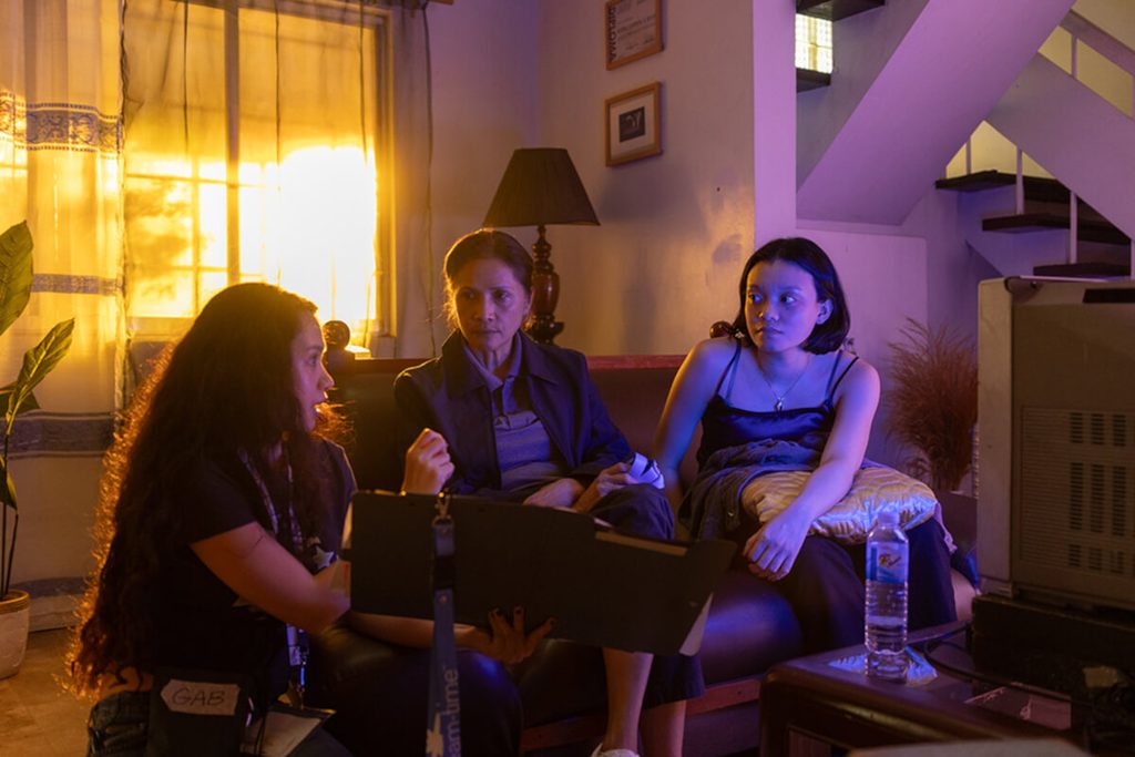 Benilde MMA Alumna Repeats as Best Director at Cinemalaya 3 Gabriela Serrano directing Agot Isidro and sister Mariana