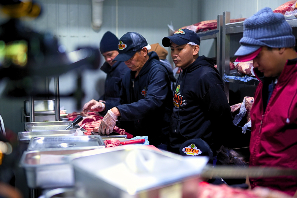 Texas Roadhouse Philippines Crowns Meat Cutting Champions for 2026 2 Texas Roadhouse meat cutters in action